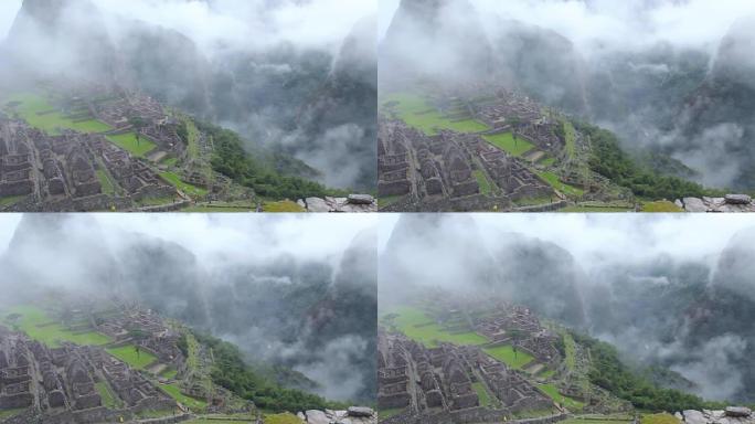秘鲁马丘比丘古印加遗址全景与晨云。