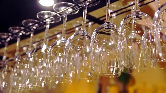 wine glasses over the bar