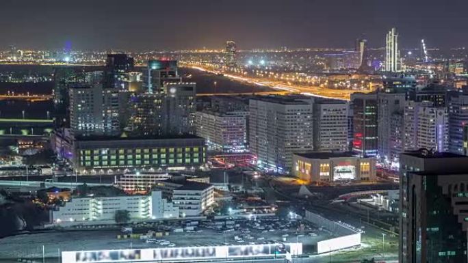 阿布扎比市中心空中天际线从夜间延时