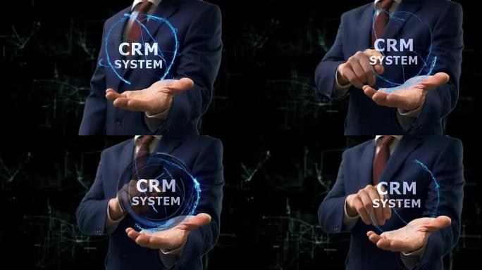 商人在手上展示概念全息图CRM系统