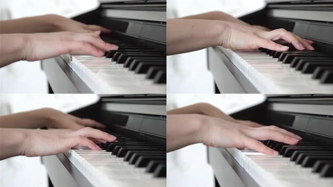 弹钢琴。特写女性弹钢琴的手。手指在钢琴上，复古色彩。近距离观察爵士钢琴家的手。弹钢琴的女人，特写。