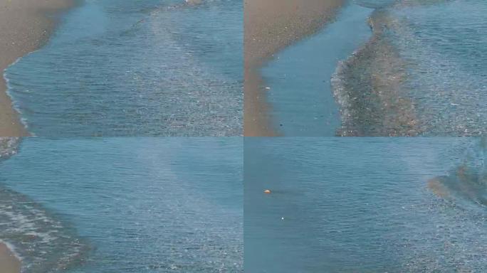 地中海美丽的绿松石波浪冲刷了沙滩