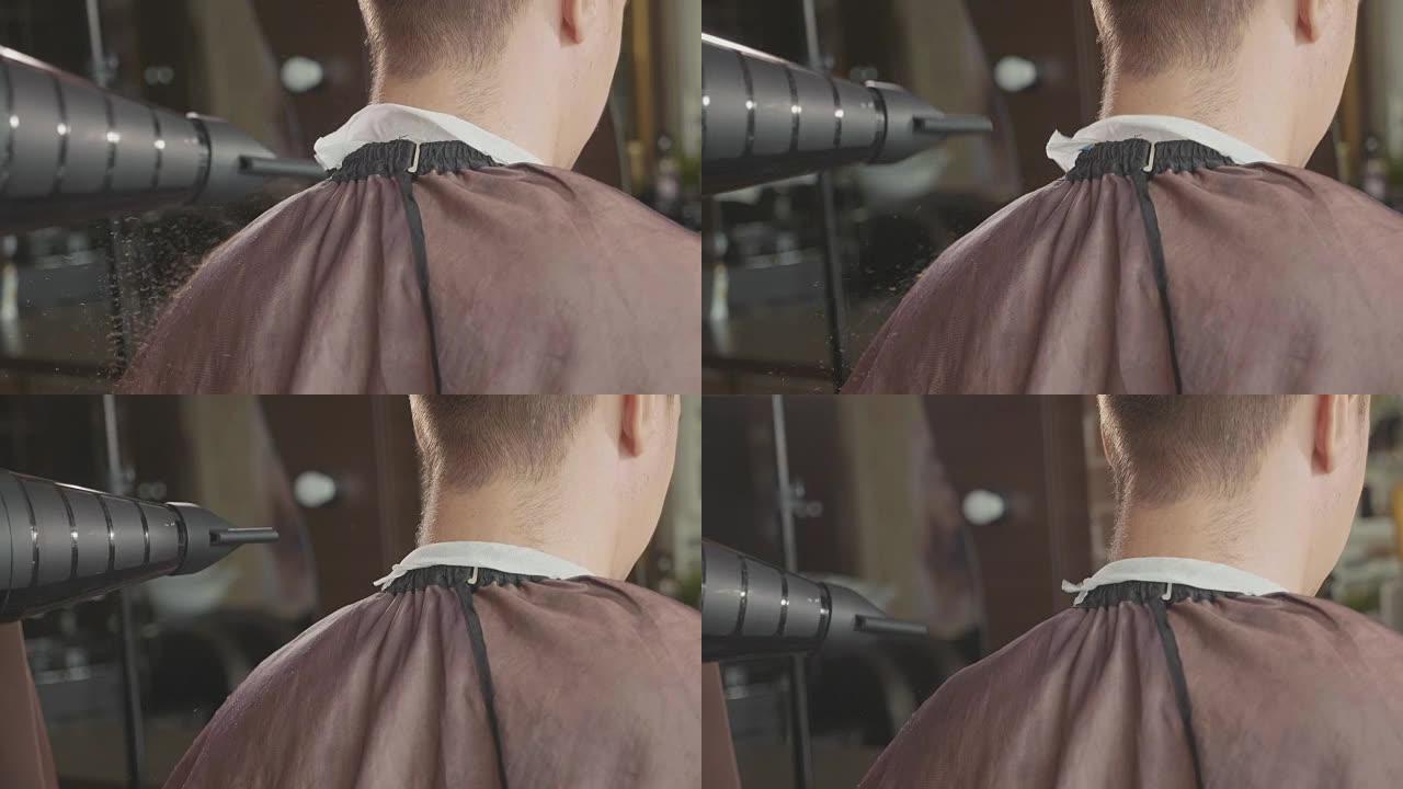 理发师完成理发，用刷子清洁顾客的脖子。
