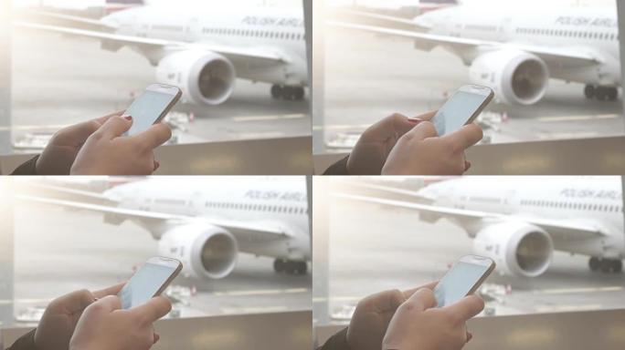 女人在机场以真实的慢动作上网的视频