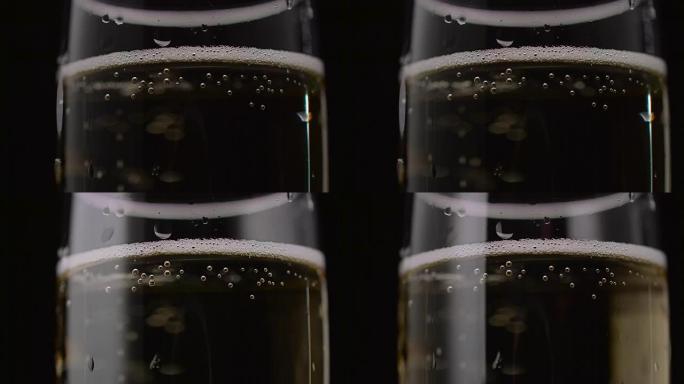 Close up of a glass of wine. Black background