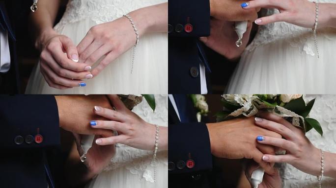新娘把手放在膝盖上。左手穿着漂亮的珍珠手镯