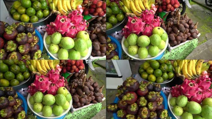 巴厘岛印度尼西亚火龙果红毛丹山竹市场上的异国热带水果