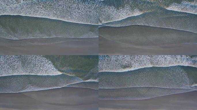偷听海浪在岸上破裂的空中无人机镜头