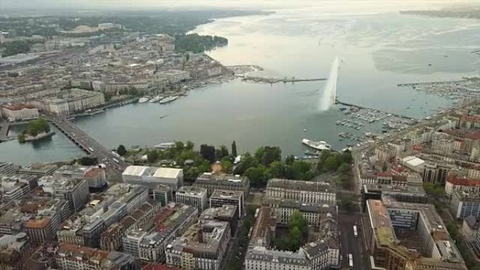 瑞士日落时间日内瓦城市景观湖边喷泉湾空中全景4k