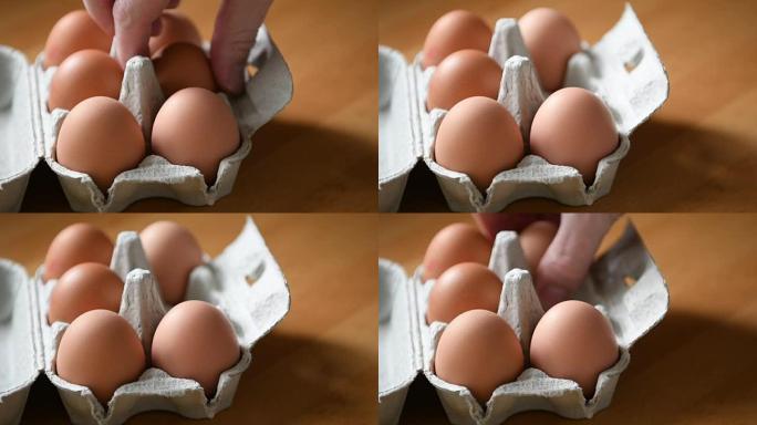 纸箱中的六个自由放养鸡蛋
