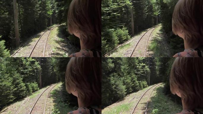 从森林中的最后一辆马车看铁路的女孩 -- 佐治亚州