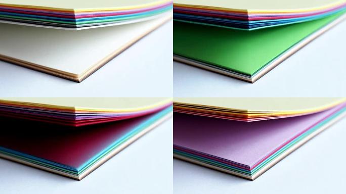 色板书。彩虹样品颜色目录。把彩纸翻过来。