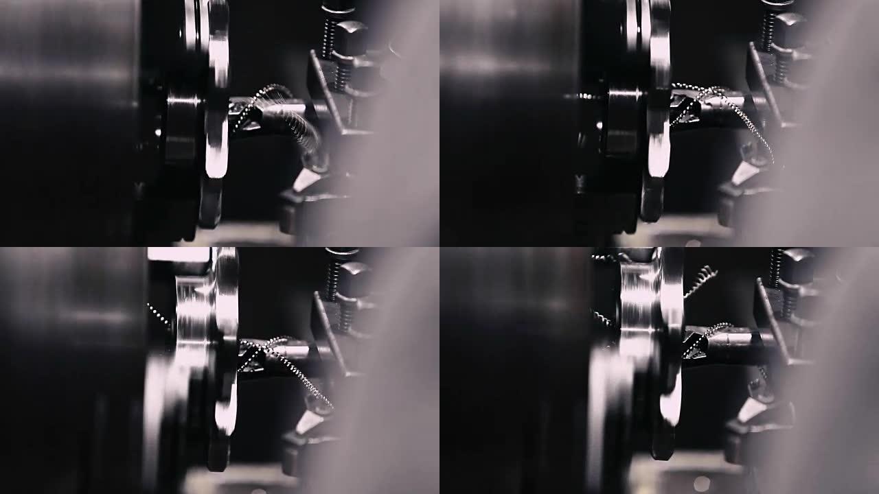 技师用氩气焊接金属管的特写，聚焦闪光灯