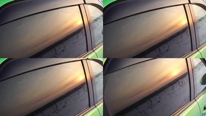 车窗中的日落日出反射。4k冬季美丽的日落
