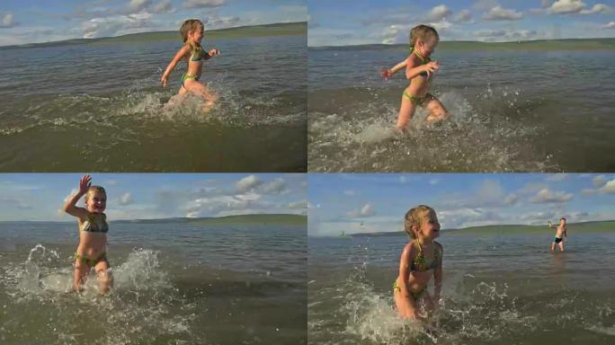 小孩在水里跑。