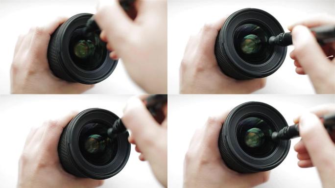 经验丰富的摄影师或视频操作员使用专业的光学清洁手柄对摄影镜头的前玻璃进行密集清洁，以防止灰尘和指纹