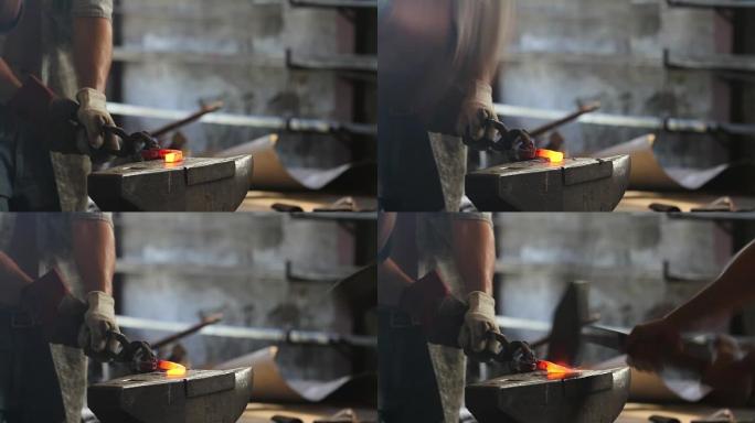 铁匠铺锻造铁水。打碎，拧，锻造热熨斗。手工制作。