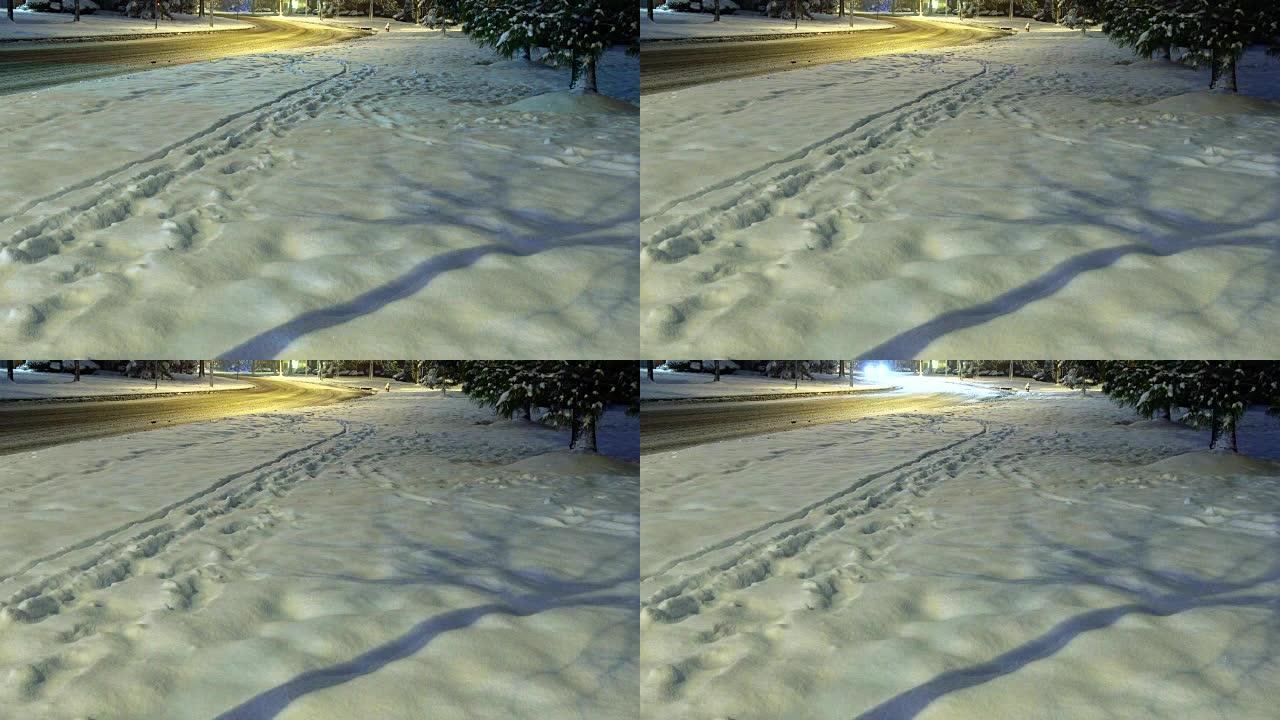 夜间有雪和雪泥的地区道路冬季危险的路况积雪覆盖并照亮了县道