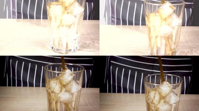 咖啡被倒入加冰的玻璃杯中