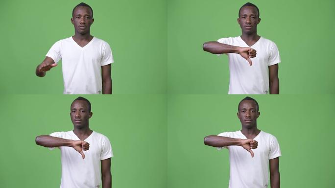 年轻的非洲男子竖起大拇指