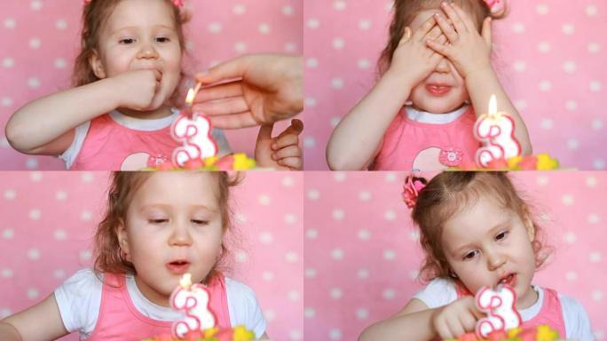 一个有趣的小女孩吃了一个美味的蛋糕，以纪念他的生日3年。一个孩子在粉红色背景的桌子上吃甜点