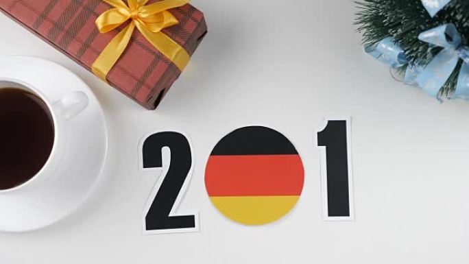 插图，新年，男性手改变年份2017年2018年，德国国旗，考特里球。