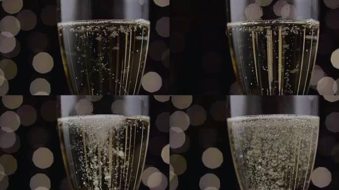 Close up of a glass of champagne. Bokeh background