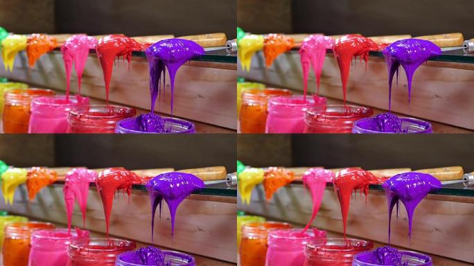塑料溶胶墨水的紫色正在滴水