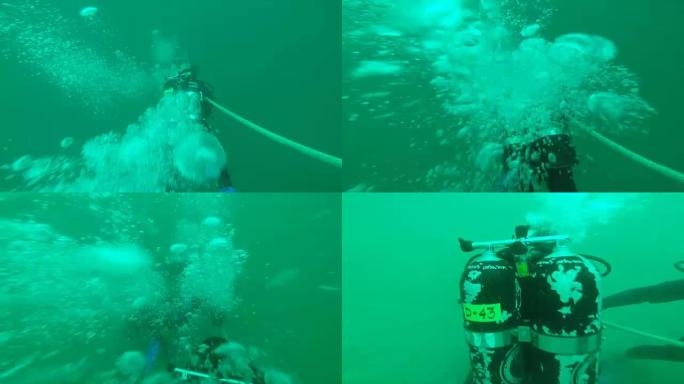 一群潜水员在水下进行水肺潜水课程