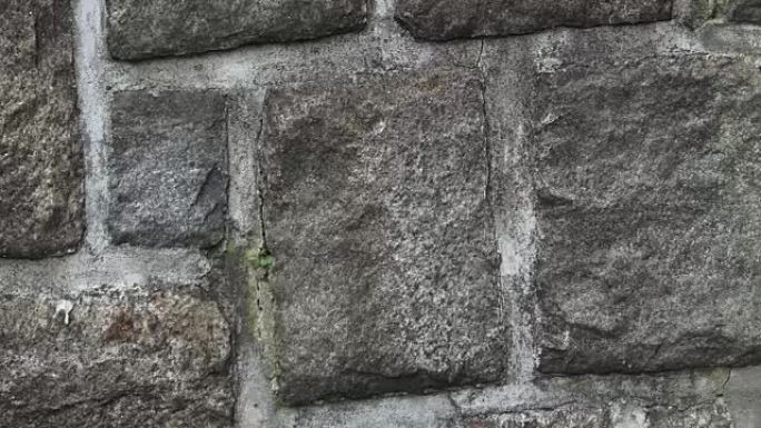 Medieval stone wall. A masonry wall. Stone wall te