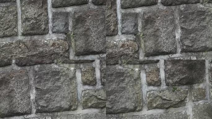 Medieval stone wall. A masonry wall. Stone wall te