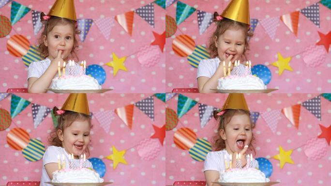 生日快乐。一个可爱的小女孩吃蛋糕，舔她的手指。