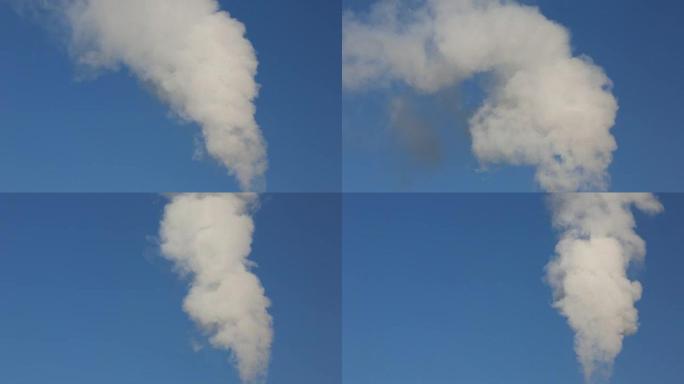 工厂烟囱中的烟雾释放出空气污染和温室气体