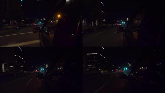 POV晚上在加利福尼亚以4k慢动作驾驶汽车