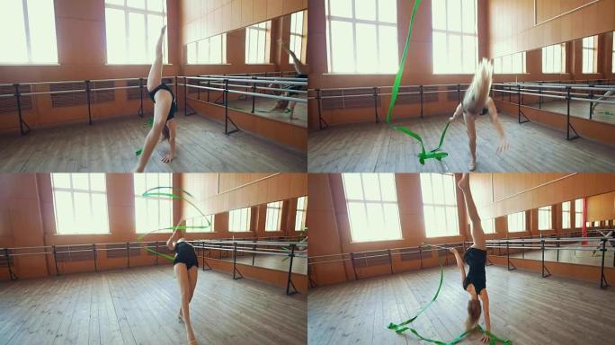 体操-年轻女子用绿丝带跳舞-训练体操，steadycam射击
