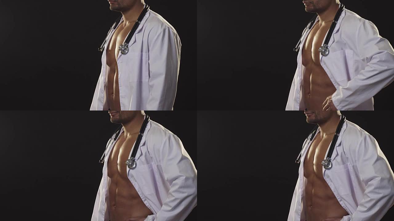 性感裸体非洲运动员肌肉男穿着实验室大衣和听诊器