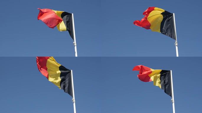 旗杆上慢动作的比利时国家象征织物