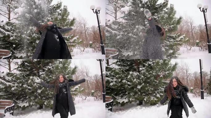 快乐的孕妇向空中扔雪。