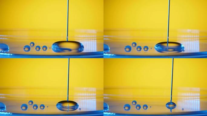 垂直针从实验室玻璃表面的小水池中吸收水