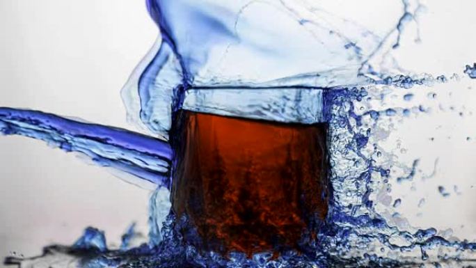 Cinemagraph of glass with red drink and splash of 