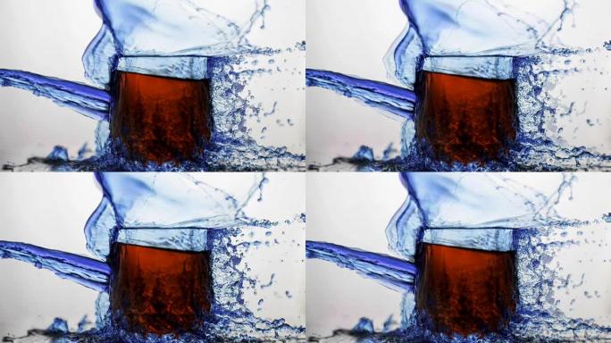Cinemagraph of glass with red drink and splash of 