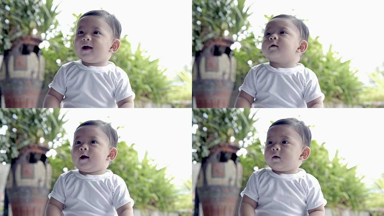亚洲男婴一个可爱的7个月大。快乐的微笑