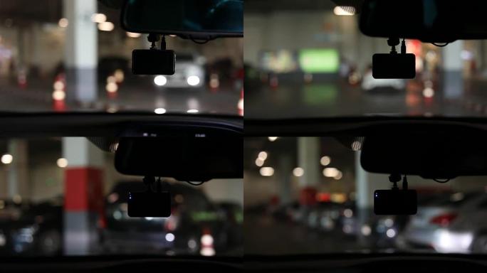 录像机，车辆在停车场行驶