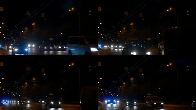 汽车在带灯的夜间道路上行驶