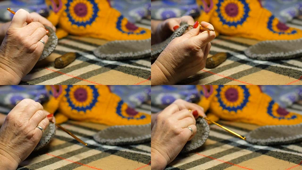 女人编织钩编毛坯制作柔软的家用拖鞋
