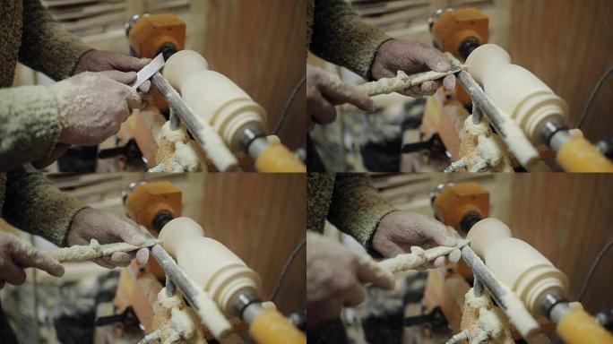 在机器上工作的木匠磨出一块木头