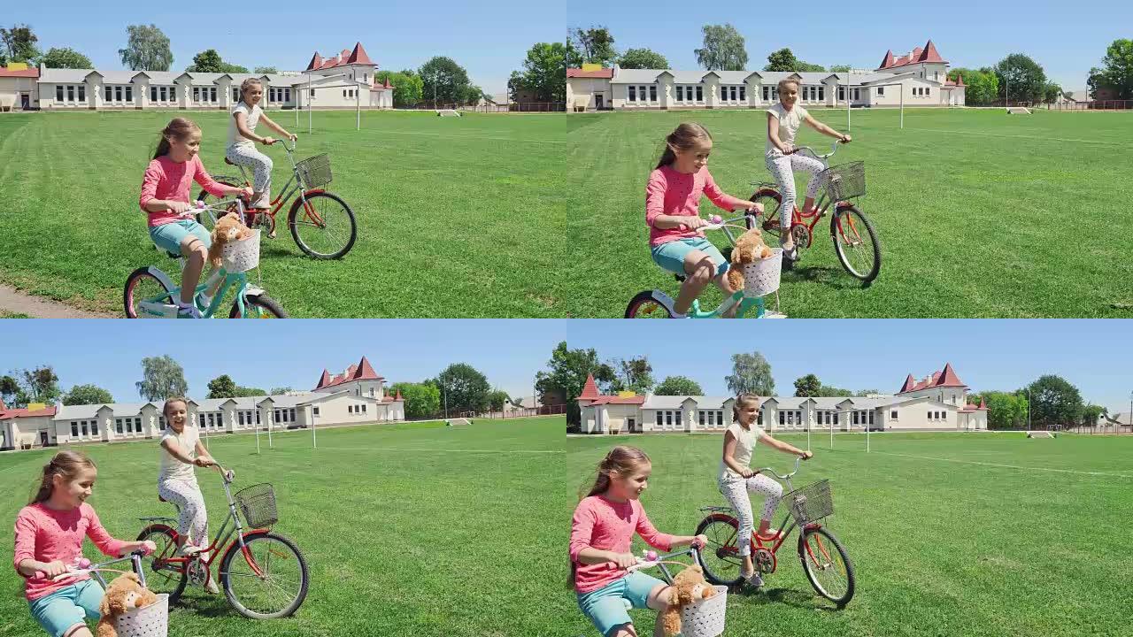 两个朋友一起骑自行车在绿草地上