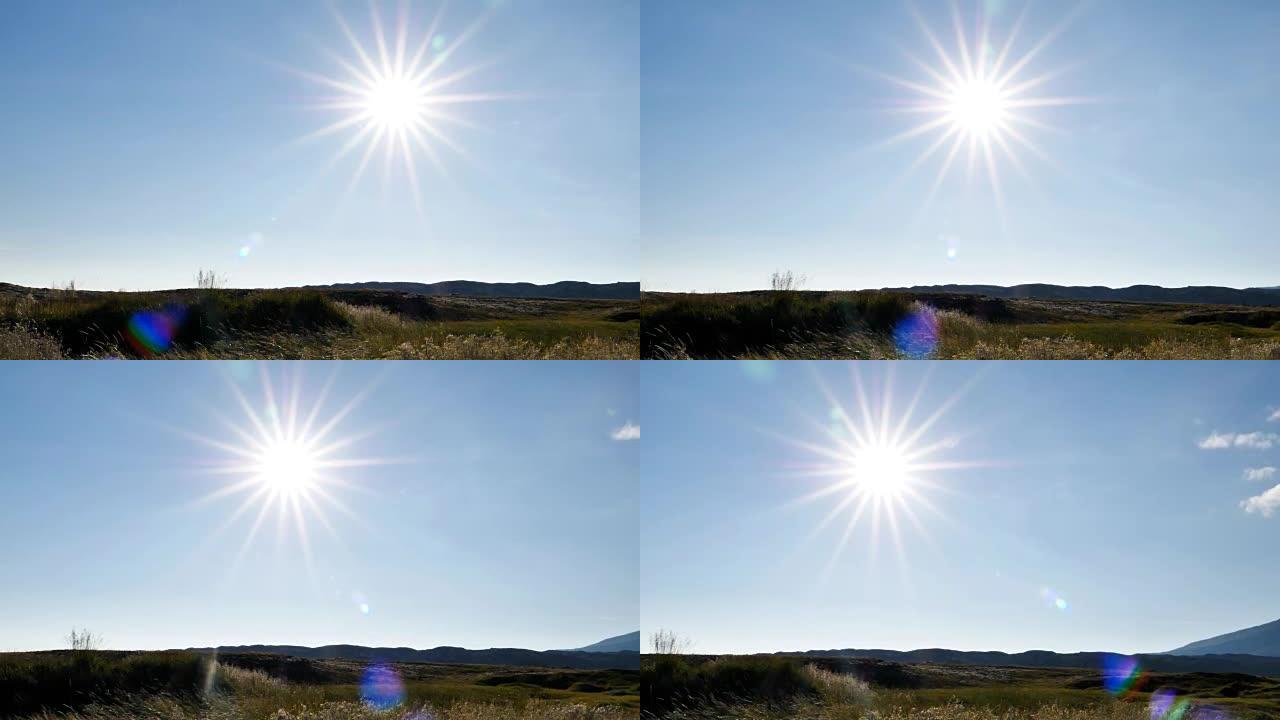 星暴太阳镜头在冰岛夏季草地上闪耀慢动作平底锅