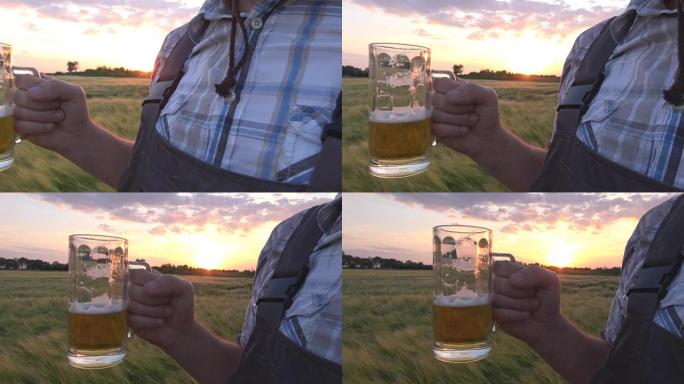 man with beer in field
