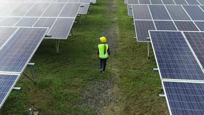 工程检查太阳能电池农场的鸟瞰图，太阳发电，